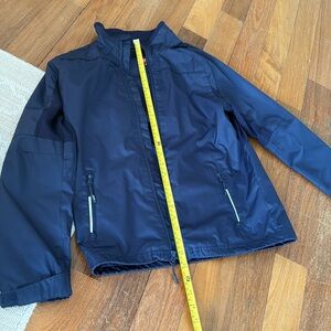 Boys youth large hockey jacket. Rain coat style. Navy with CCM